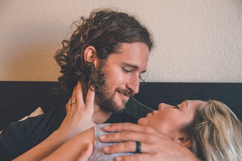 A man holding a woman and smiling. Represents the need for couples counseling to help keep a relationship exciting in Katy, TX 77494