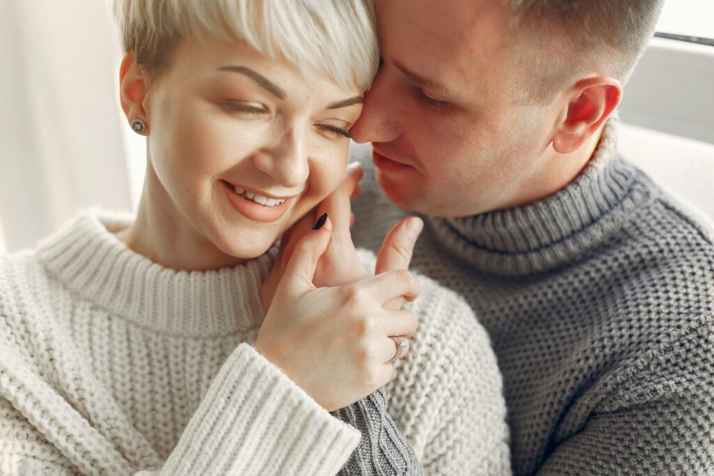 A man touching a woman's face. Represents emotional intimacy in relationships in Katy, TX 77494