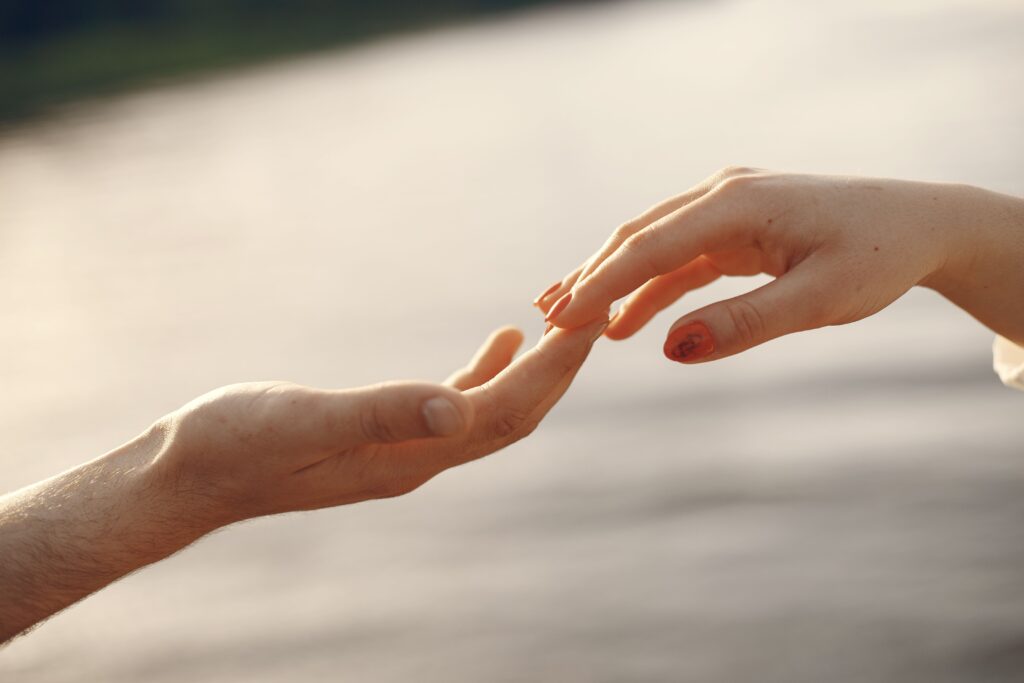 Hands touching. Represents how to rebuild intimacy in relationships in Katy, TX