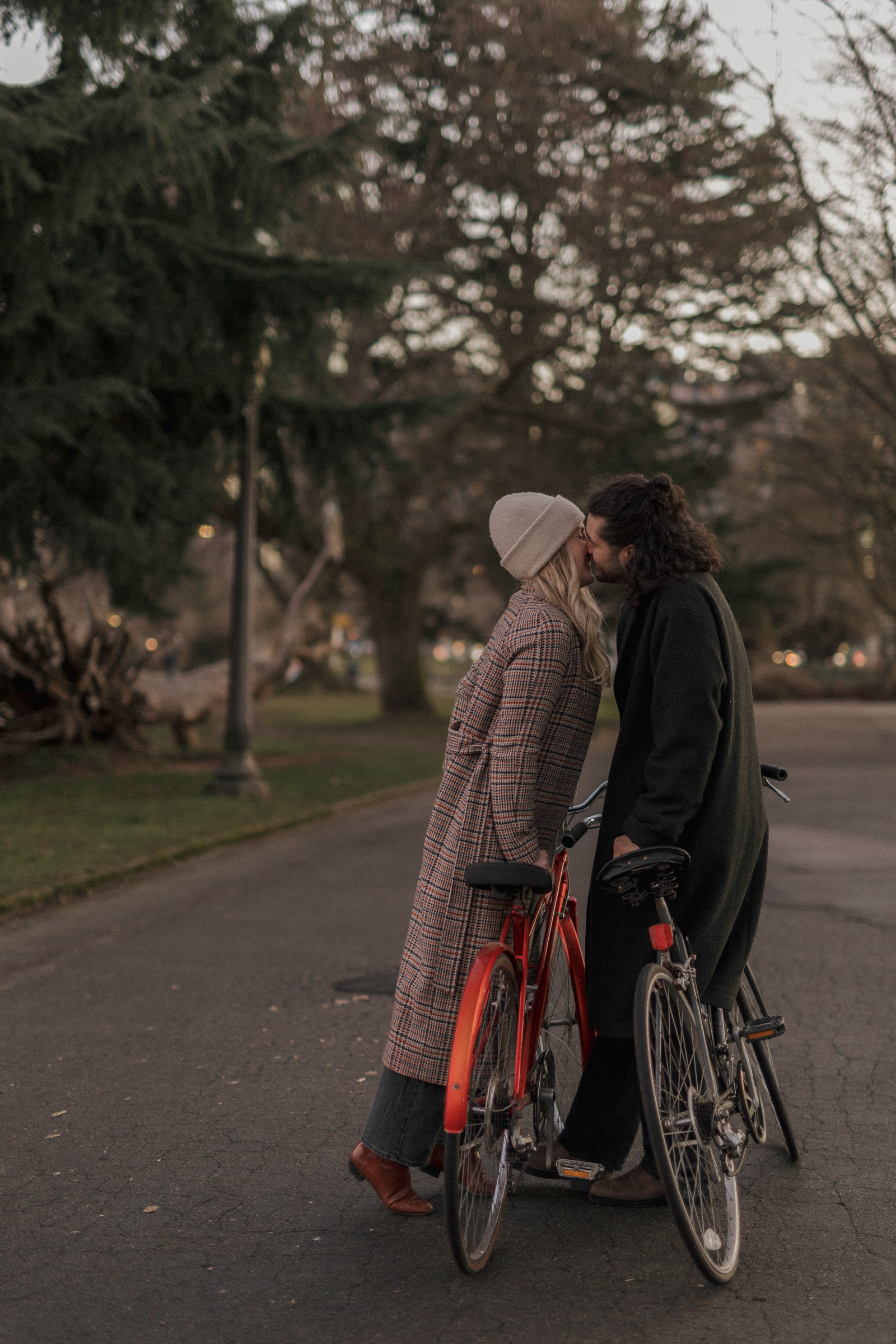 A couple kissing at a bike. Represents couples counseling with Dr. Cheri Locke at Locke Counseling in Texas.